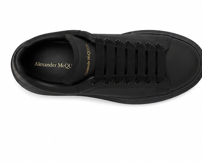 Alexander McQueen black sneaker top view on white background