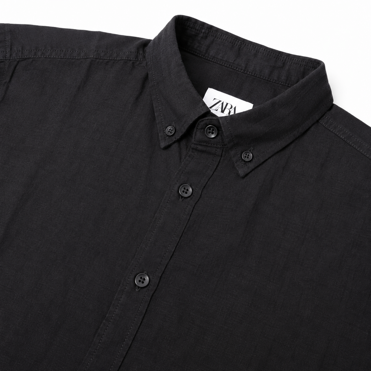 Black linen shirt collar and fabric detail