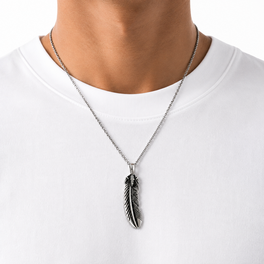 925 Italian Silver Feather Necklace worn on a white T-shirt