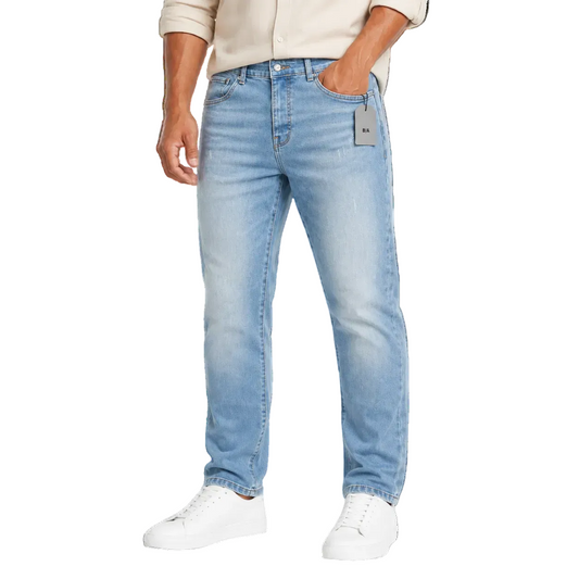 Light wash blue straight fit jeans on model